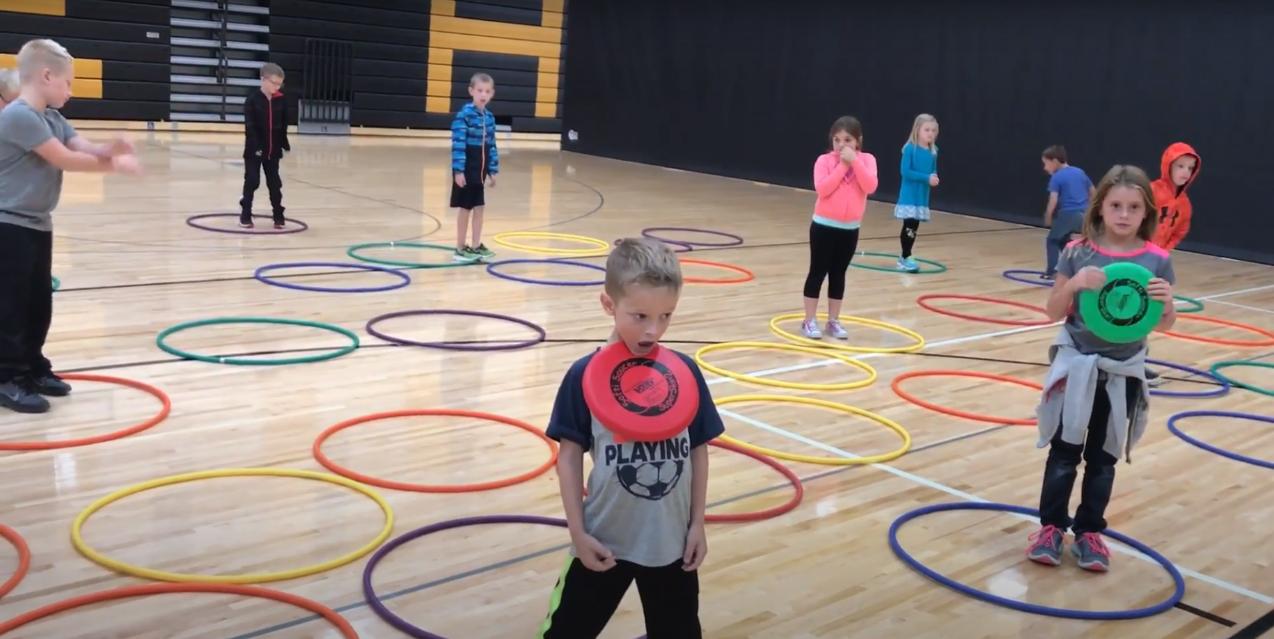 physical education activities with hula hoops